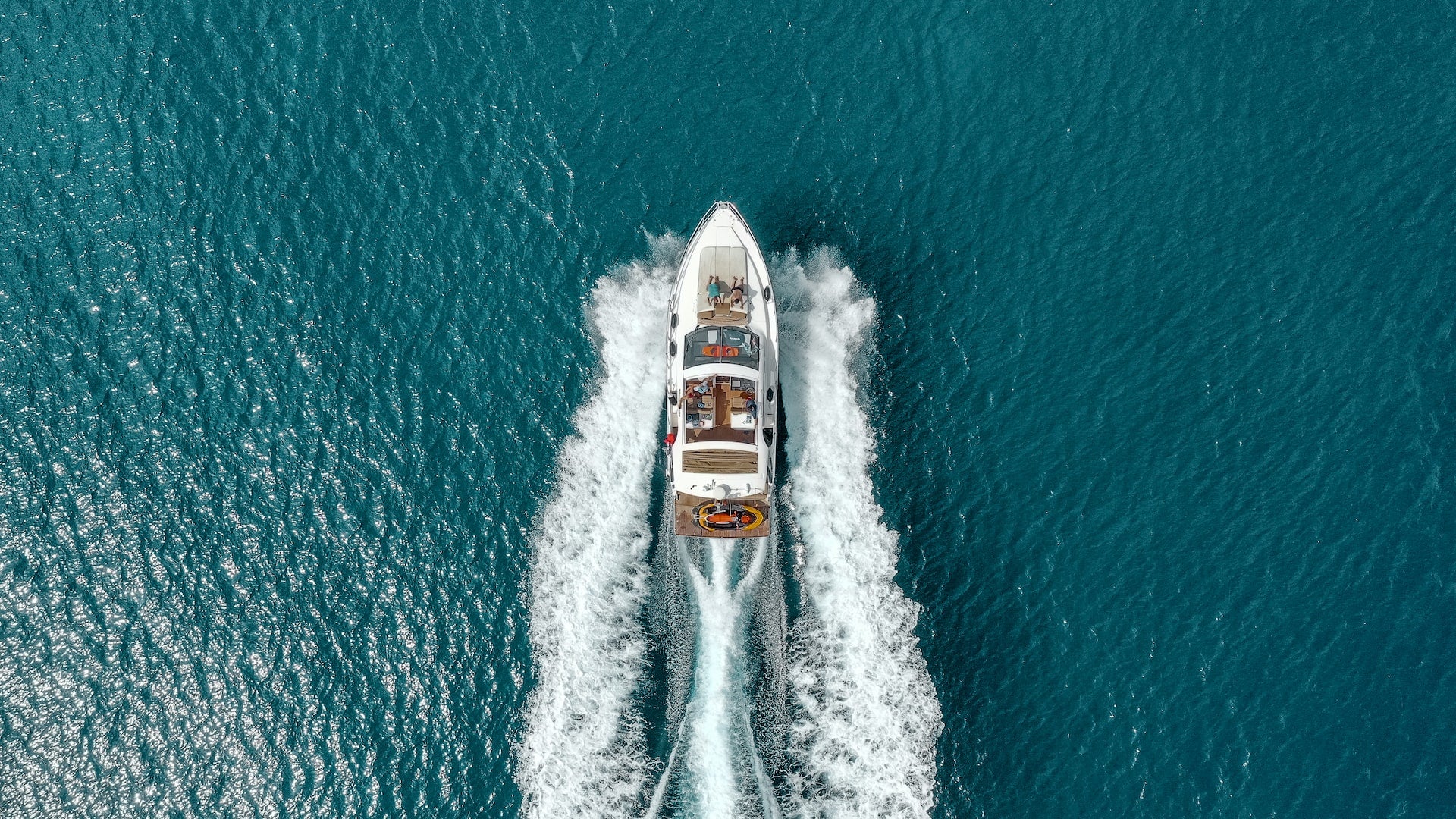a power boat going fast across water