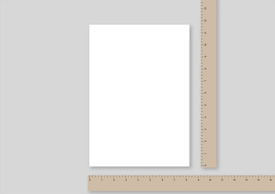 A4 sized paper with a ruler beside it