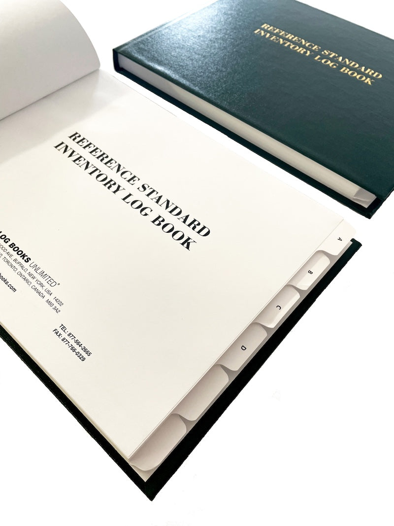 A black log book with reference standard inventory text on the cover.