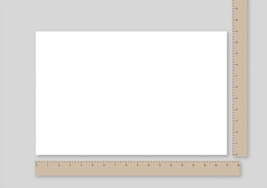 tabloid sized paper with a ruler beside it