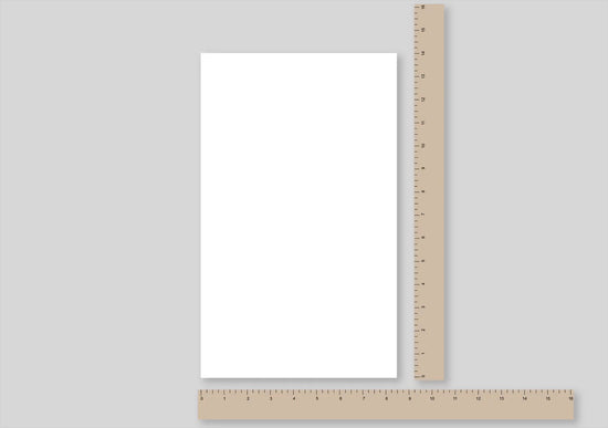 legal sized paper with a ruler beside it