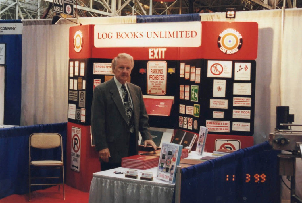 the Log Books booth at a convention from 1999